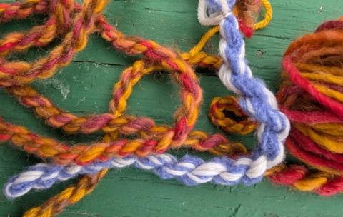 various colored pieces of twisted yarn